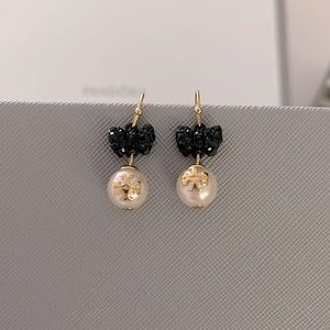 Tory Burch bow pearl earrings